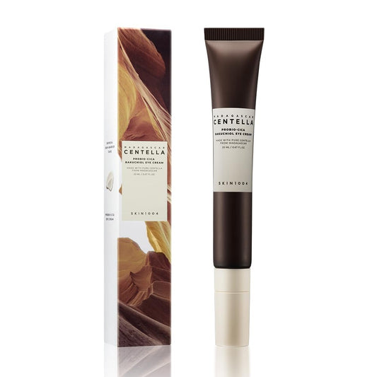 Crema para el contorno de ojos beige de SKIN1004, con empaque a juego con diseño de cañón.